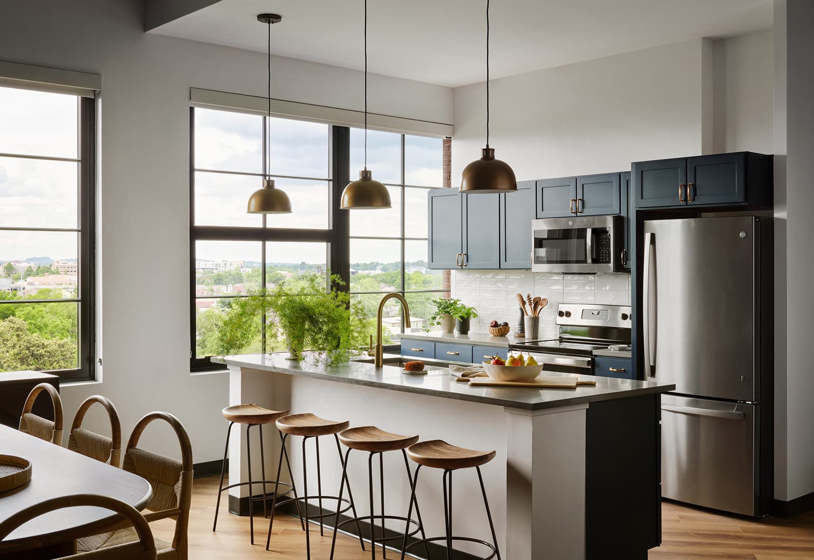 Kitchen with island and blue cabinets